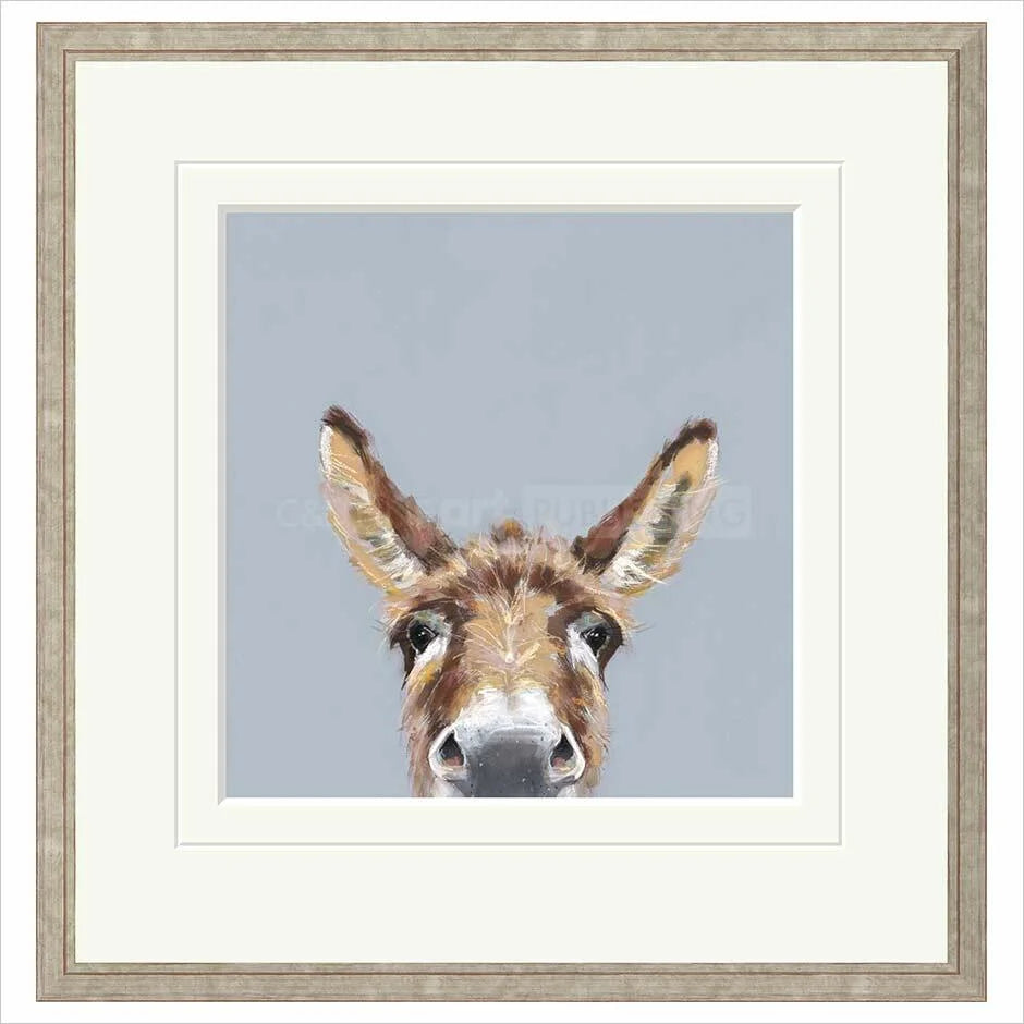 Framed artwork of a donkey's face on a gray background