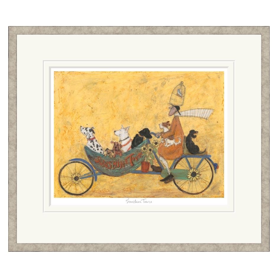 Framed artwork of a person riding a bicycle with animals on a yellow background