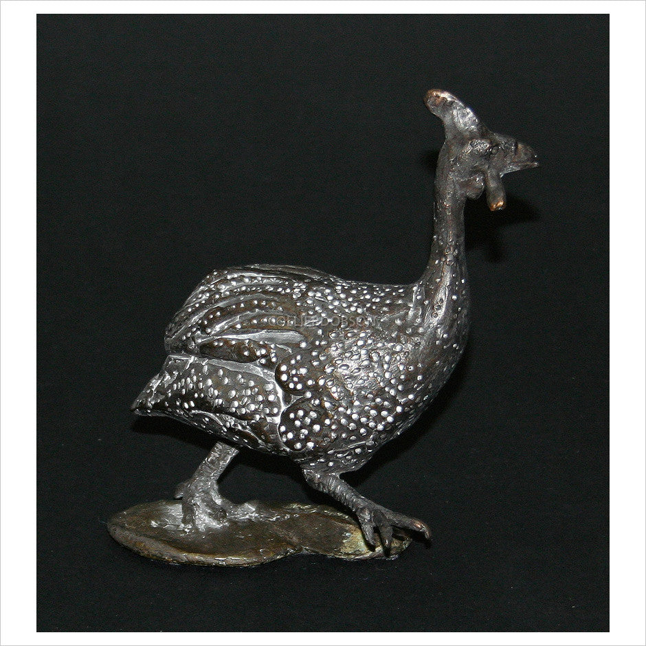 Guinea Fowl - Running by Hamish Mackie