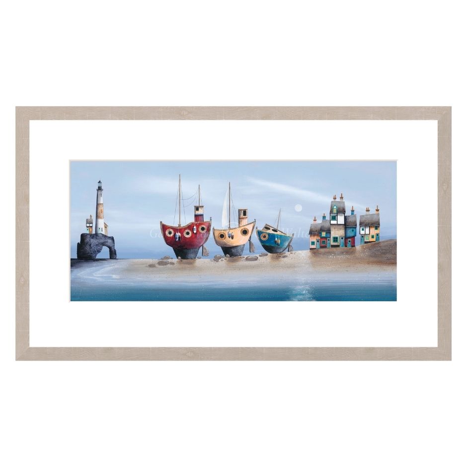 Framed artwork of colorful boats and a lighthouse on a beach.