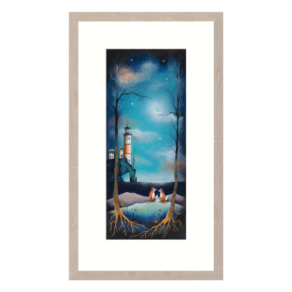 Framed artwork of a lighthouse and couple under a starry sky.