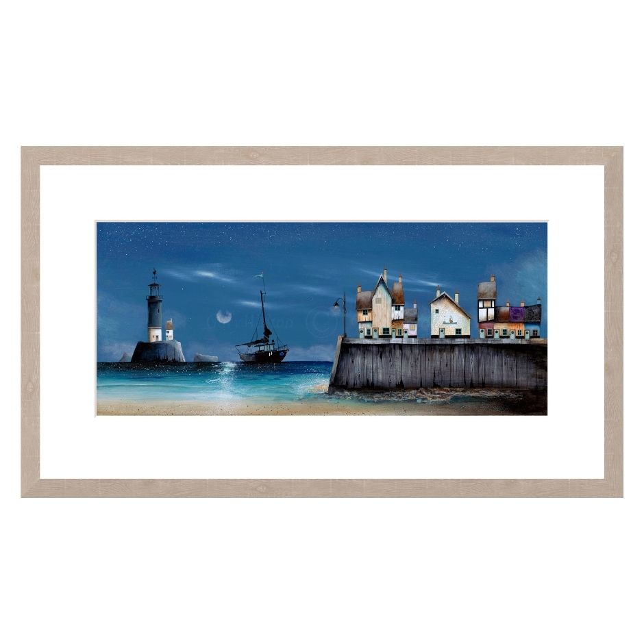 Framed artwork of a coastal scene with a lighthouse, boat, and houses.