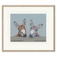 Framed artwork of two donkeys with a plain background