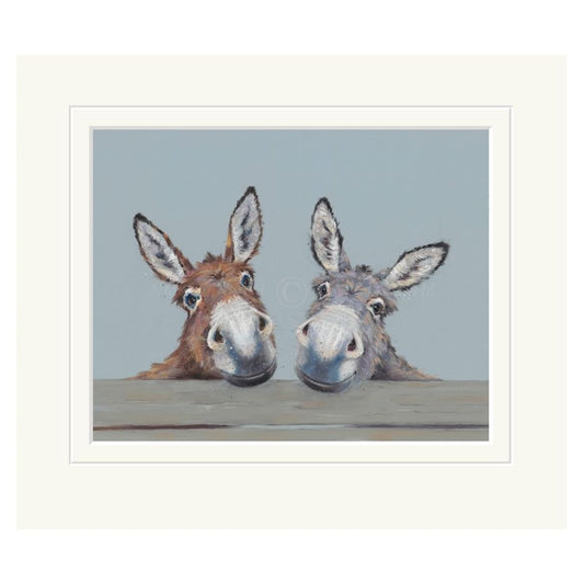 Mounted artwork of two donkeys peeking over a surface with a light blue background