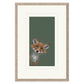 Framed artwork of a fox peeking over a green background