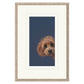 Framed artwork of a dog's face on a blue background