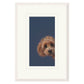 Framed artwork of a dog's face on a blue background