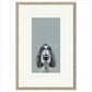 Framed artwork of a dog's portrait on a gray background