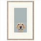 Framed artwork of a dog's face on a light blue background