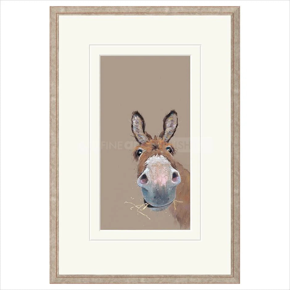 Framed artwork of a donkey's face on a beige background