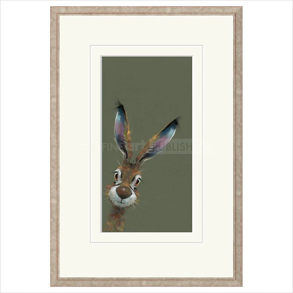 Framed artwork of a rabbit's face on a green background