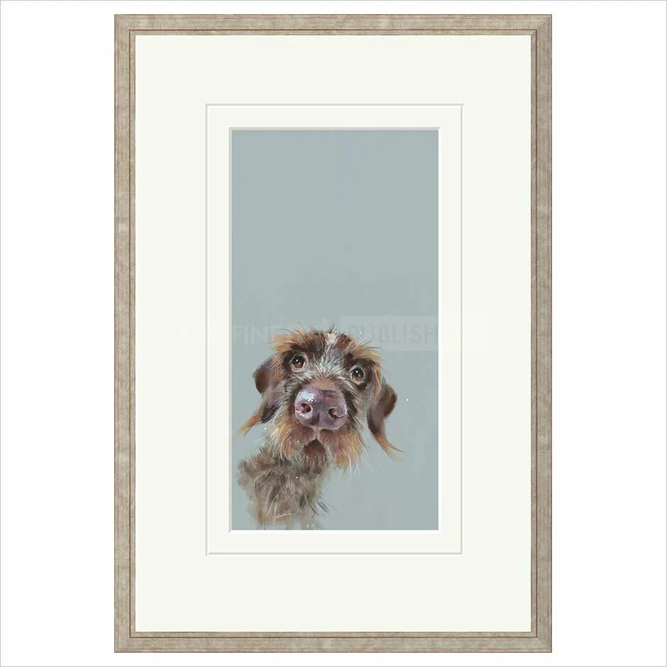 Framed artwork of a dog's face on a light blue background