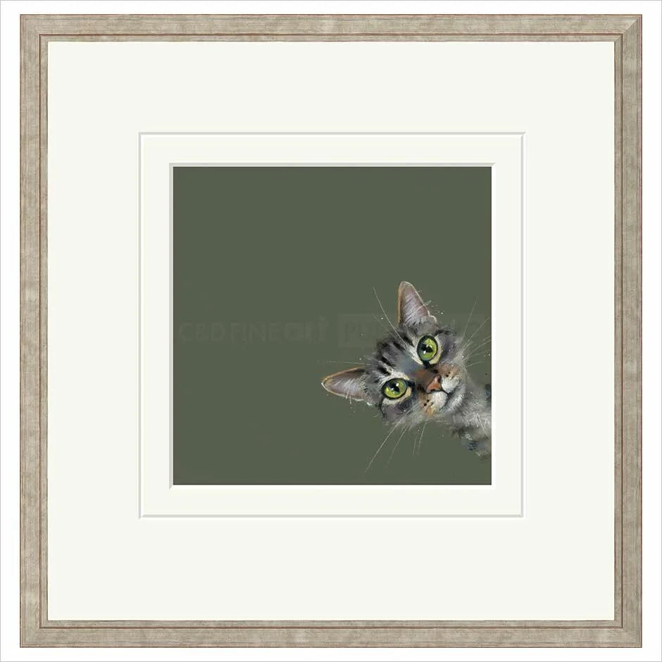 Framed artwork of a cat's face on a green background