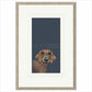 Framed artwork of a dachshund on a dark background