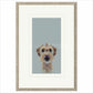 Framed artwork of a dog's face on a light blue background