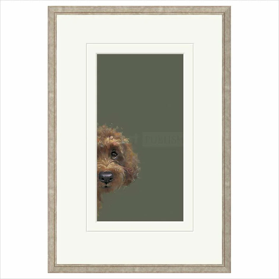 Framed artwork of a dog's face on a green background