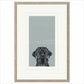 Framed artwork of a black dog on a light blue background