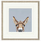 Framed artwork of a donkey's face on a gray background