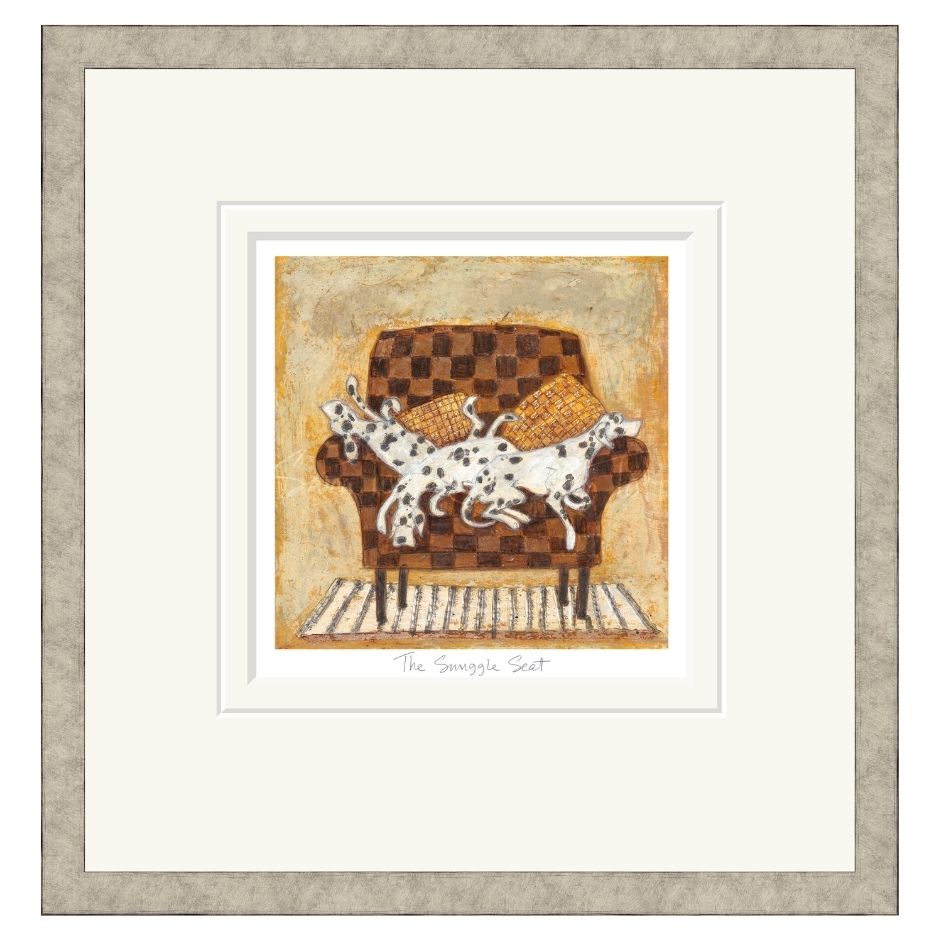 Framed illustration of two black and white dogs laying on a patterned sofa against a beige background.