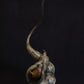 Bronze sculpture wren in pea pod