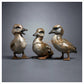 Seated Duckling with Duckling and Quacking Duckling by Fred Gordon
