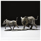 Elephant Calf Chasing Warthog by Hamish Mackie